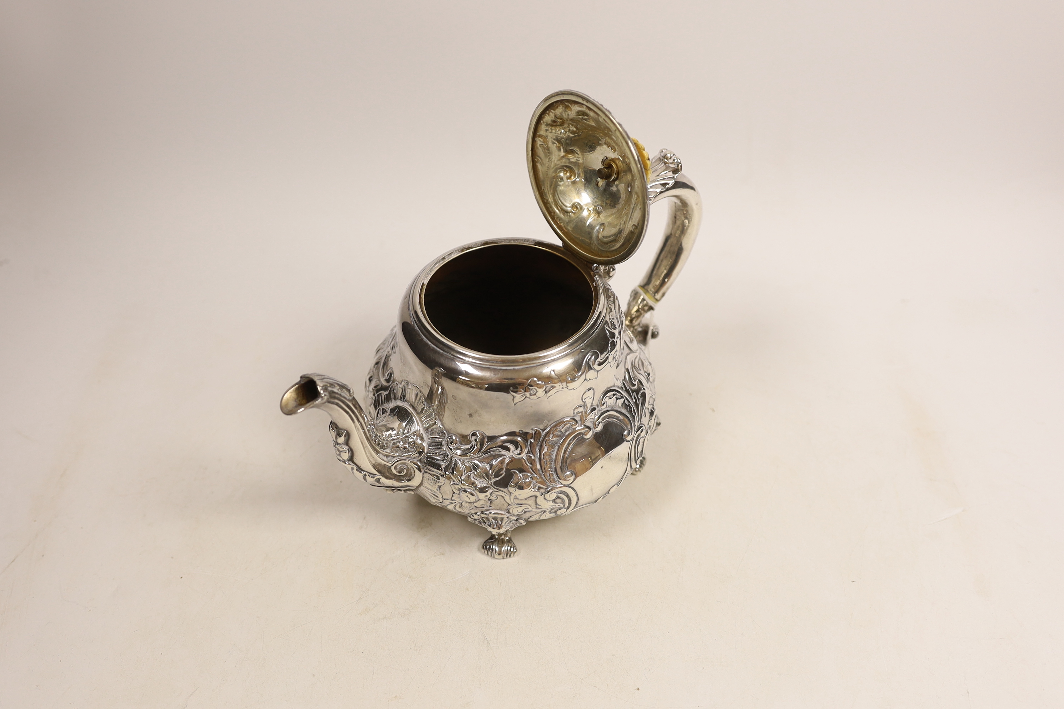 An early Victorian embossed silver teapot, Robert Hennell III, London, 1843, gross weight 22.2oz. CITES Submission reference XJSNPB34